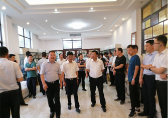 Huaining County Party and Government Delegation Visited Baishijia Company for Inspection and Guidance